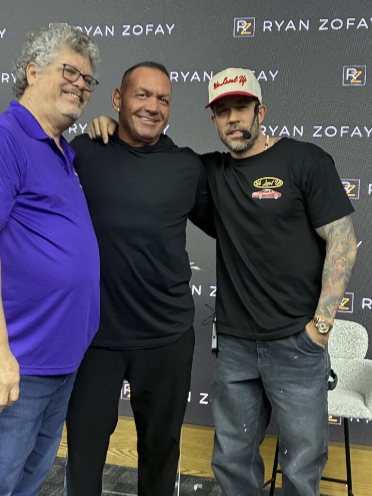 Anthony L is pictured in the middle with Ryan Zofay on Right during a leadership training and coaching seminar.